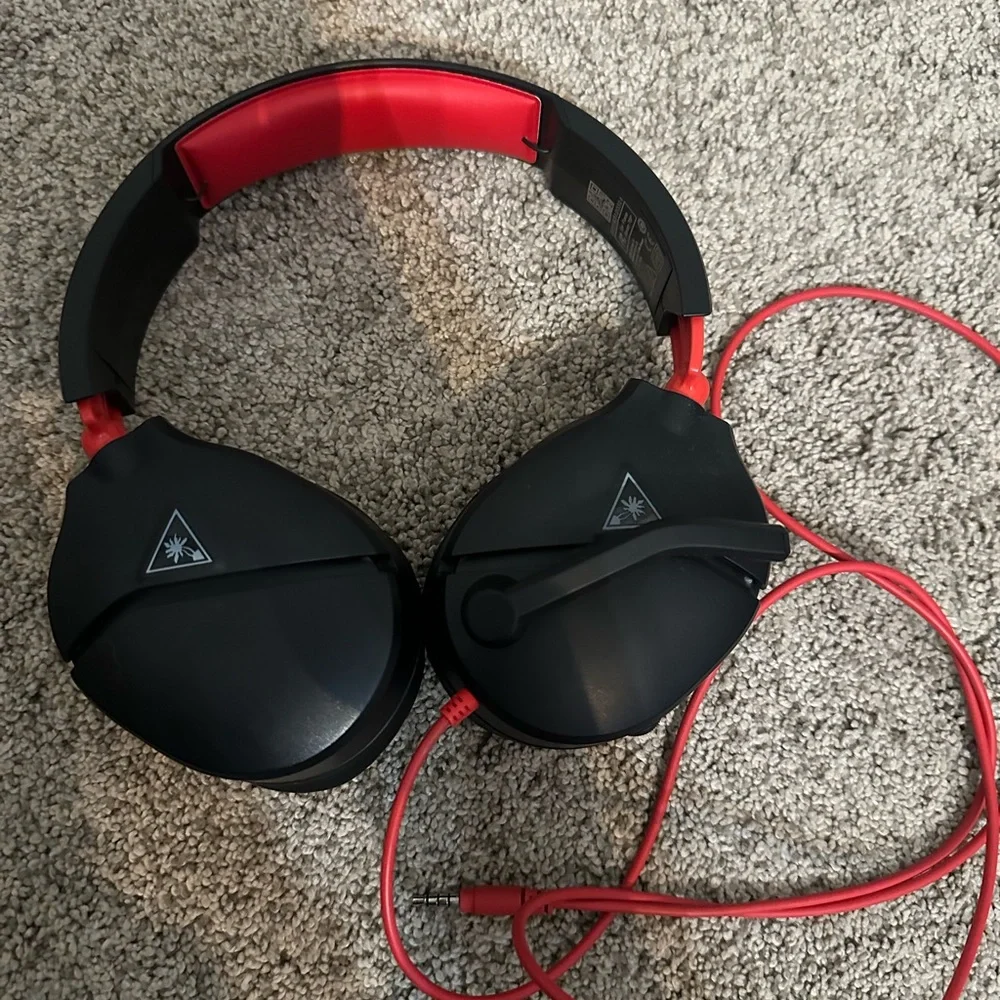 Xbox Console with Black Controller and Red Headset